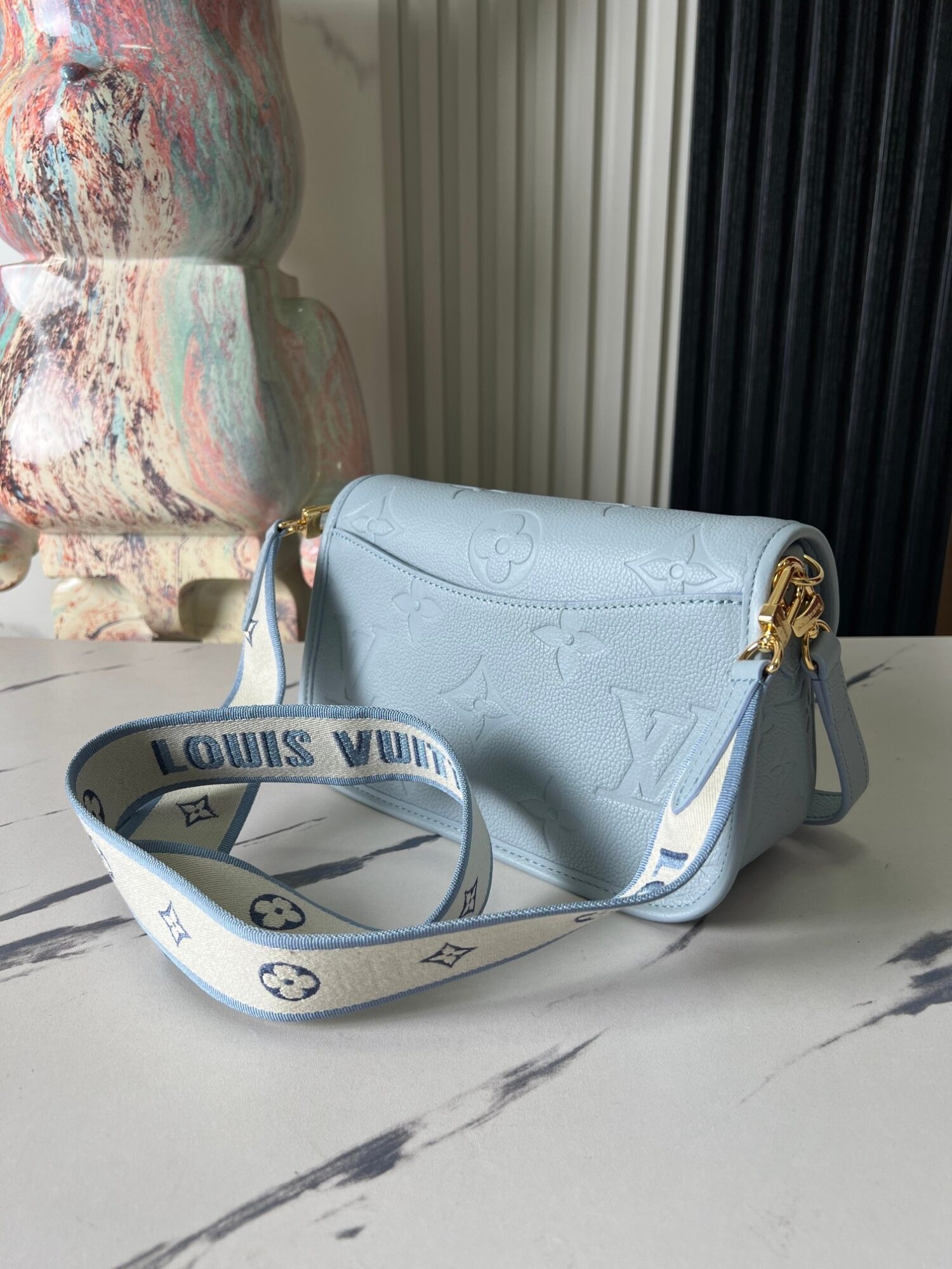 Louis Vuitton This Diane handbag infuses Monogram Empreinte embossed leather with elegant tones.