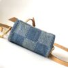 Louis Vuitton N40682 — FW New Denim Collection. The Sunset bag takes center stage in Monogram Denim canvas.