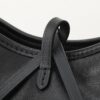 Louis Vuitton This small CarryAll Cargo handbag is crafted from soft lambskin, featuring a stylishly micro-crinkled finish.