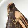 Louis Vuitton The M46784 High-Rise Bag is crafted from Montaigne-coated canvas.