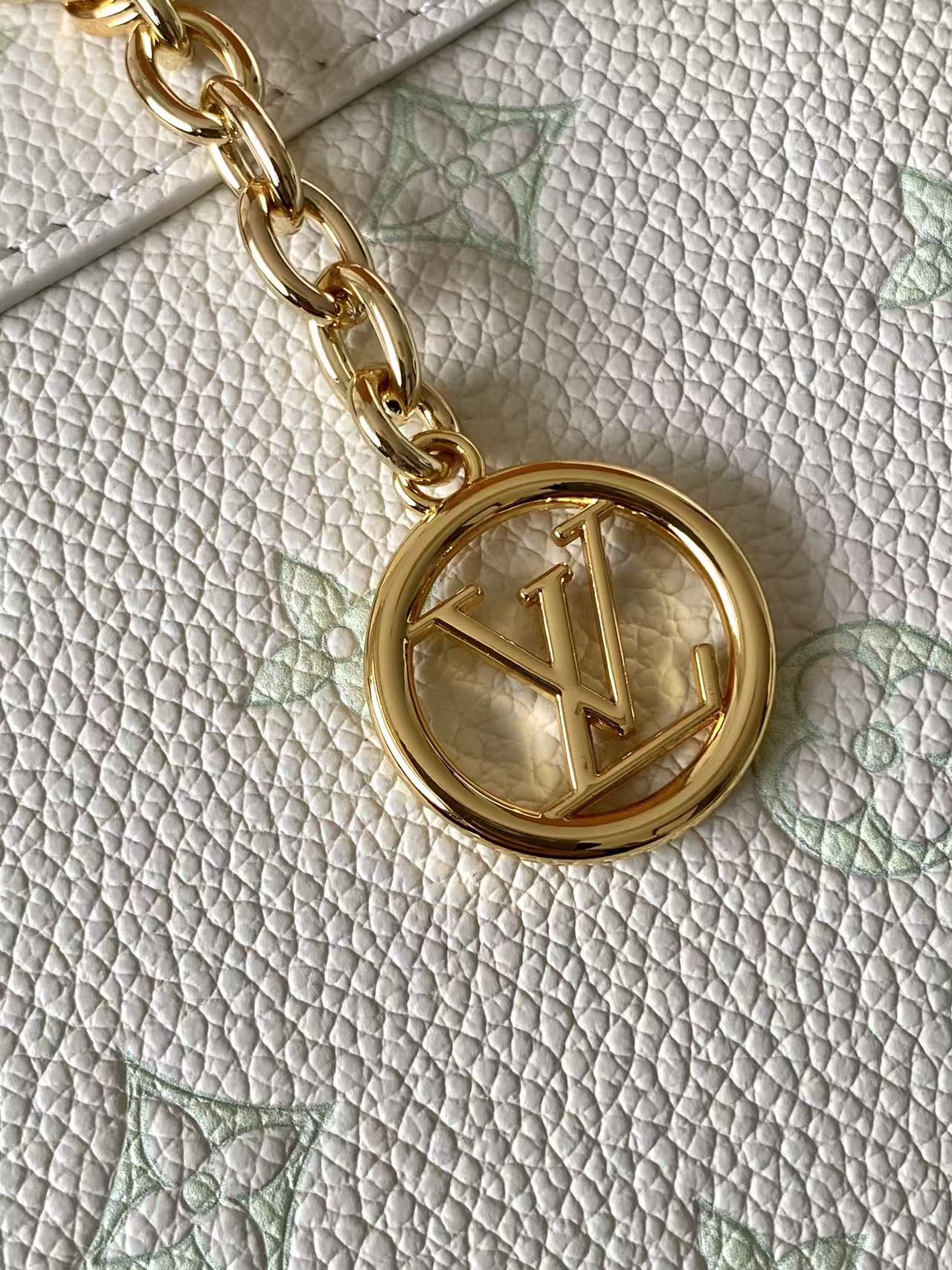 Louis Vuitton This Nano Madeleine handbag reimagines the Madeleine in Monogram Empreinte leather.