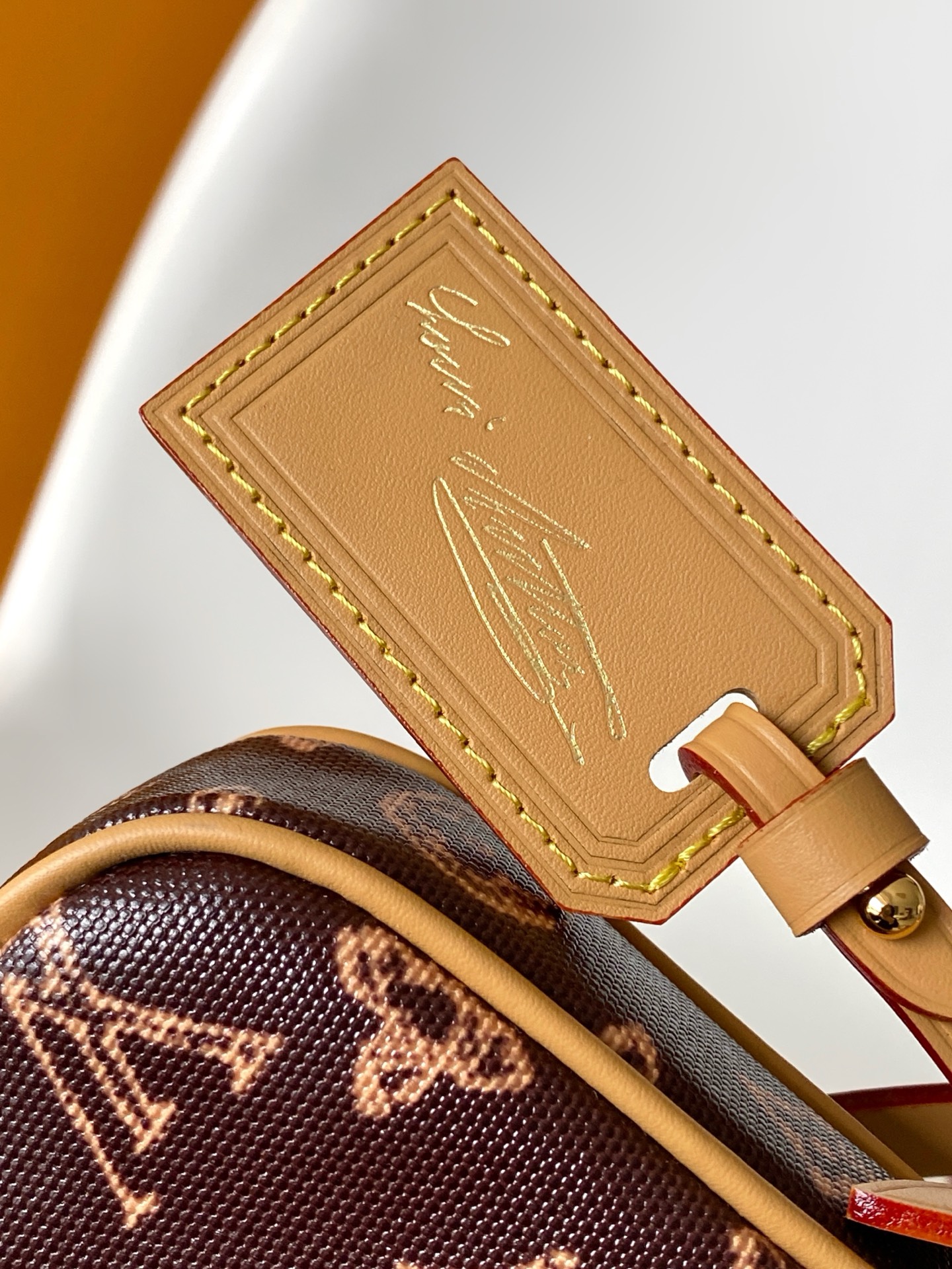 Louis Vuitton This Pochette Accessoires handbag is specially designed to celebrate the birth of the Louis Vuitton Monogram pattern.