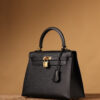 Hermes Kelly bag, black, 25cm, with gold hardware.