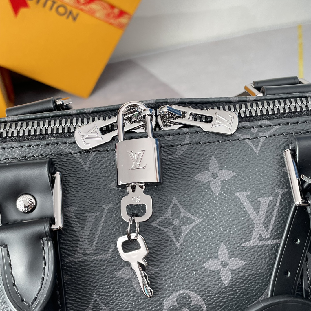 Louis Vuitton The Keepall 50 travel bag, crafted from the new, iconic black and grey Monogram Eclipse canvas.