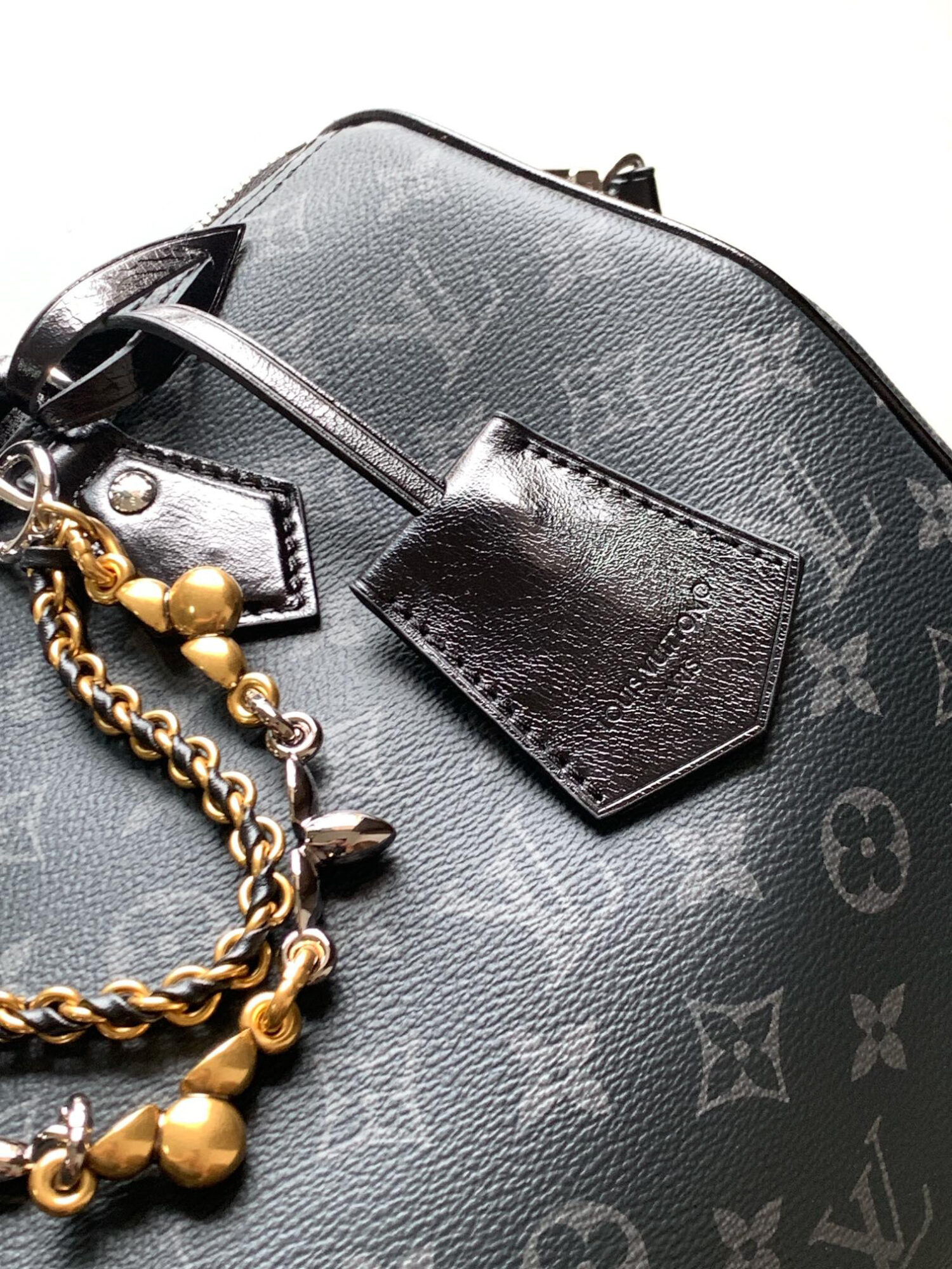 Louis Vuitton This Speedy Soft 30 handbag, part of the Ski Collection, reimagines the classic design in Monogram Eclipse canvas.