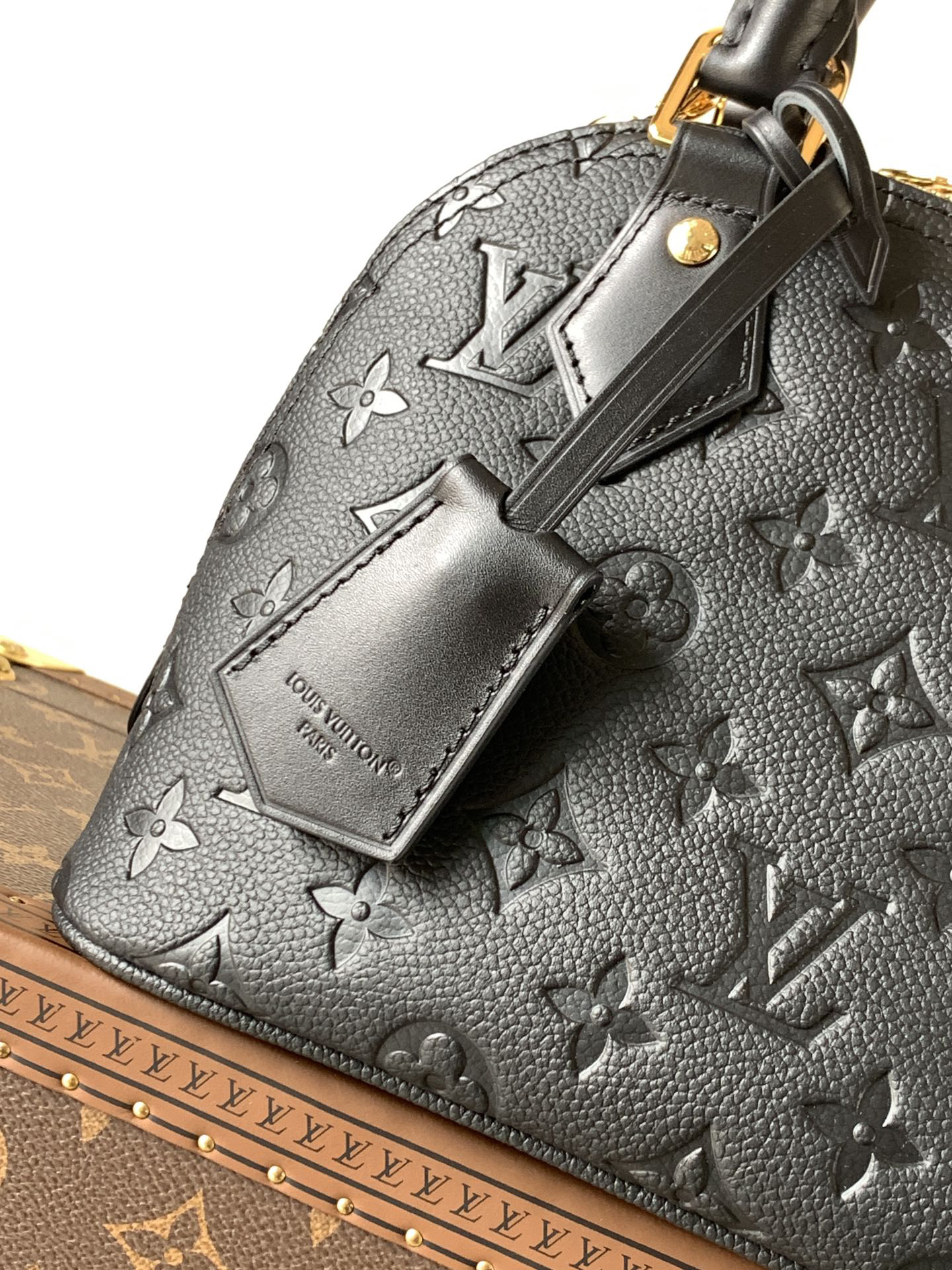 Louis Vuitton This Alma BB handbag showcases the iconic Alma BB silhouette, crafted from the House's exceptionally soft Monogram Empreinte leather.
