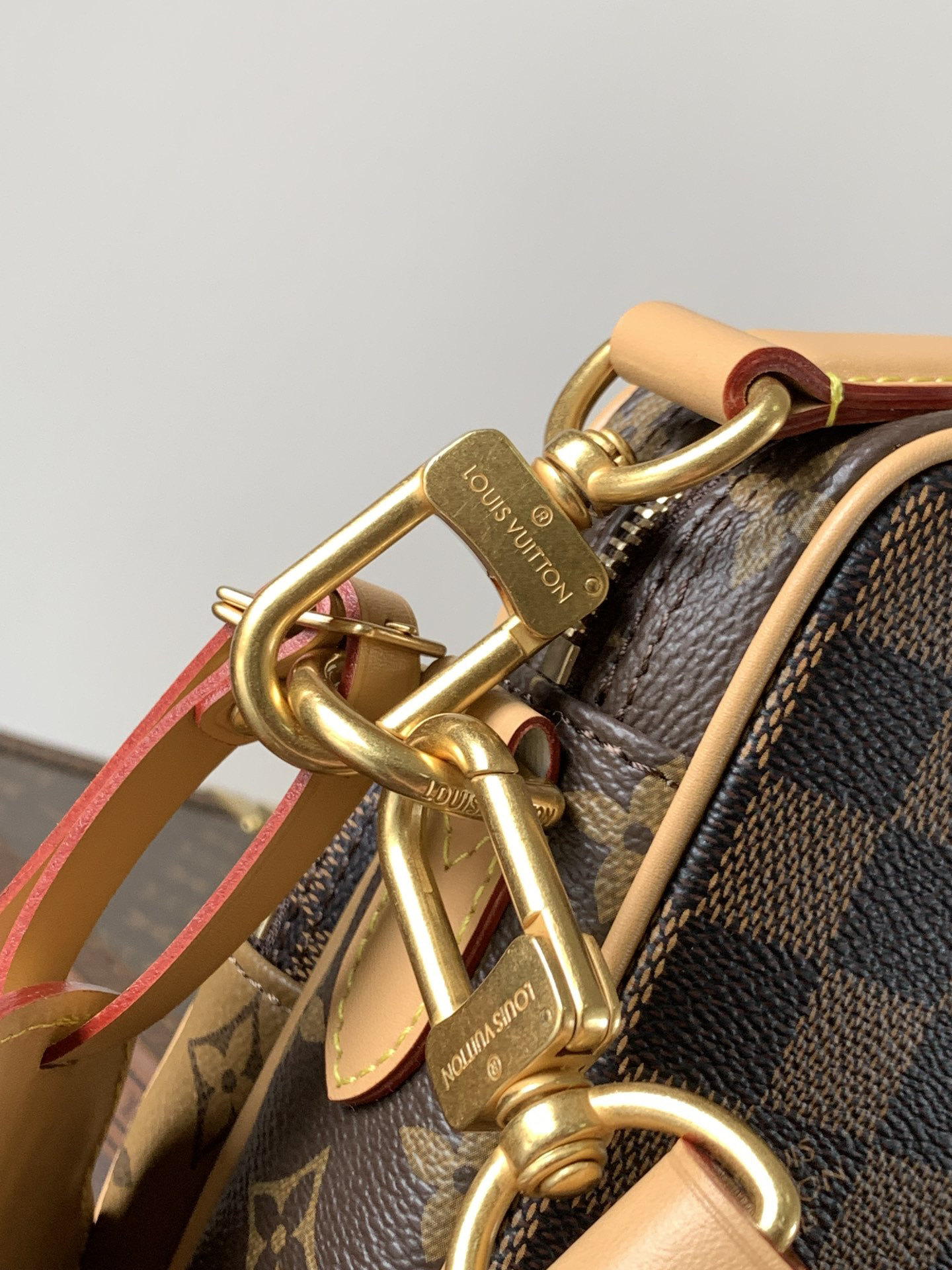 Louis Vuitton This Nil messenger bag features a Monogram canvas body accented with Damier and Monogram Reverse canvas patches, creating an elegant patchwork effect.