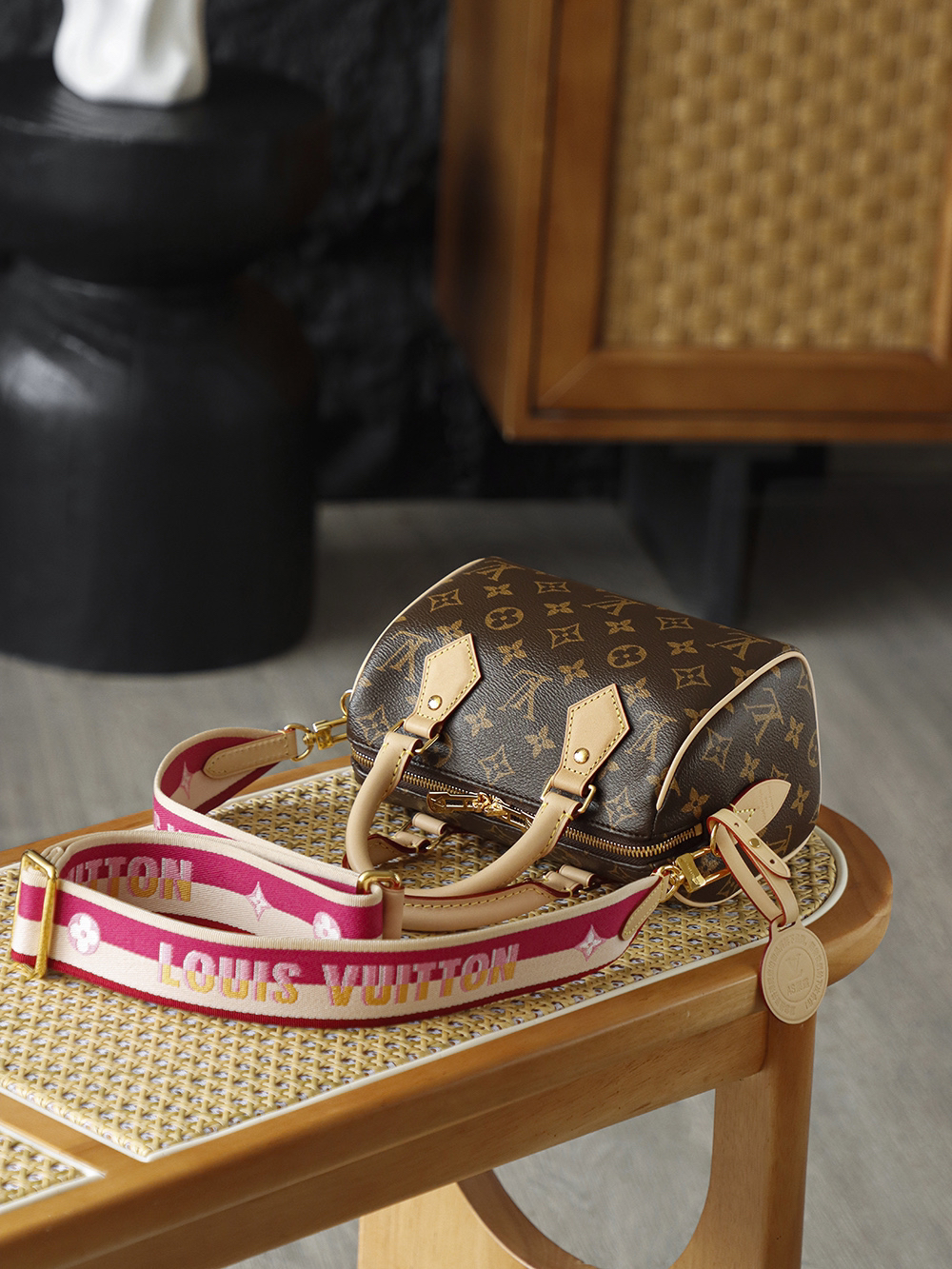 Louis Vuitton The Speedy Bandoulière 20 carries the DNA of a century-old heritage, featuring an iconic, three-dimensional "pillow" silhouette that is both sleek and structured.