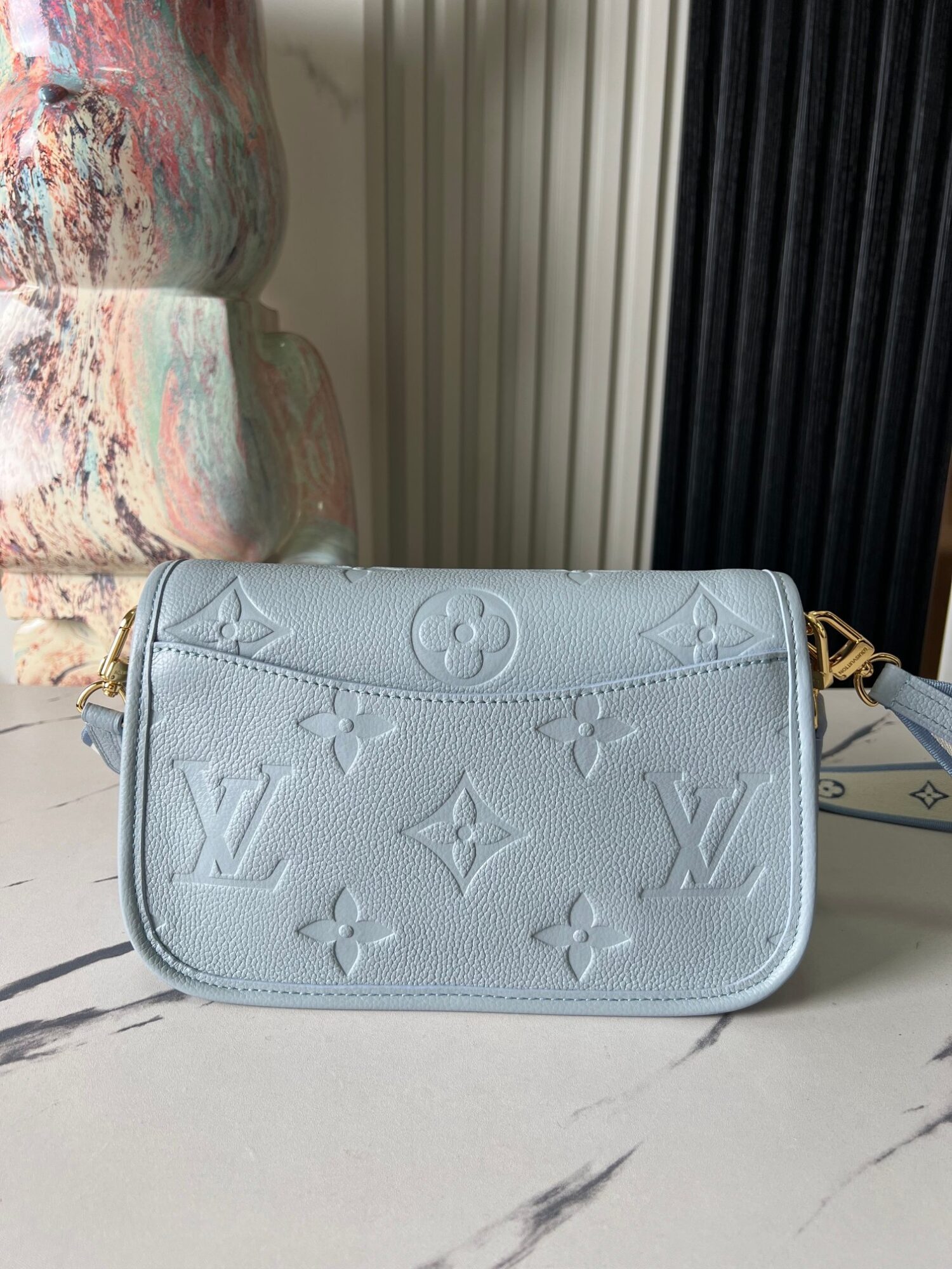 Louis Vuitton This Diane handbag infuses Monogram Empreinte embossed leather with elegant tones.