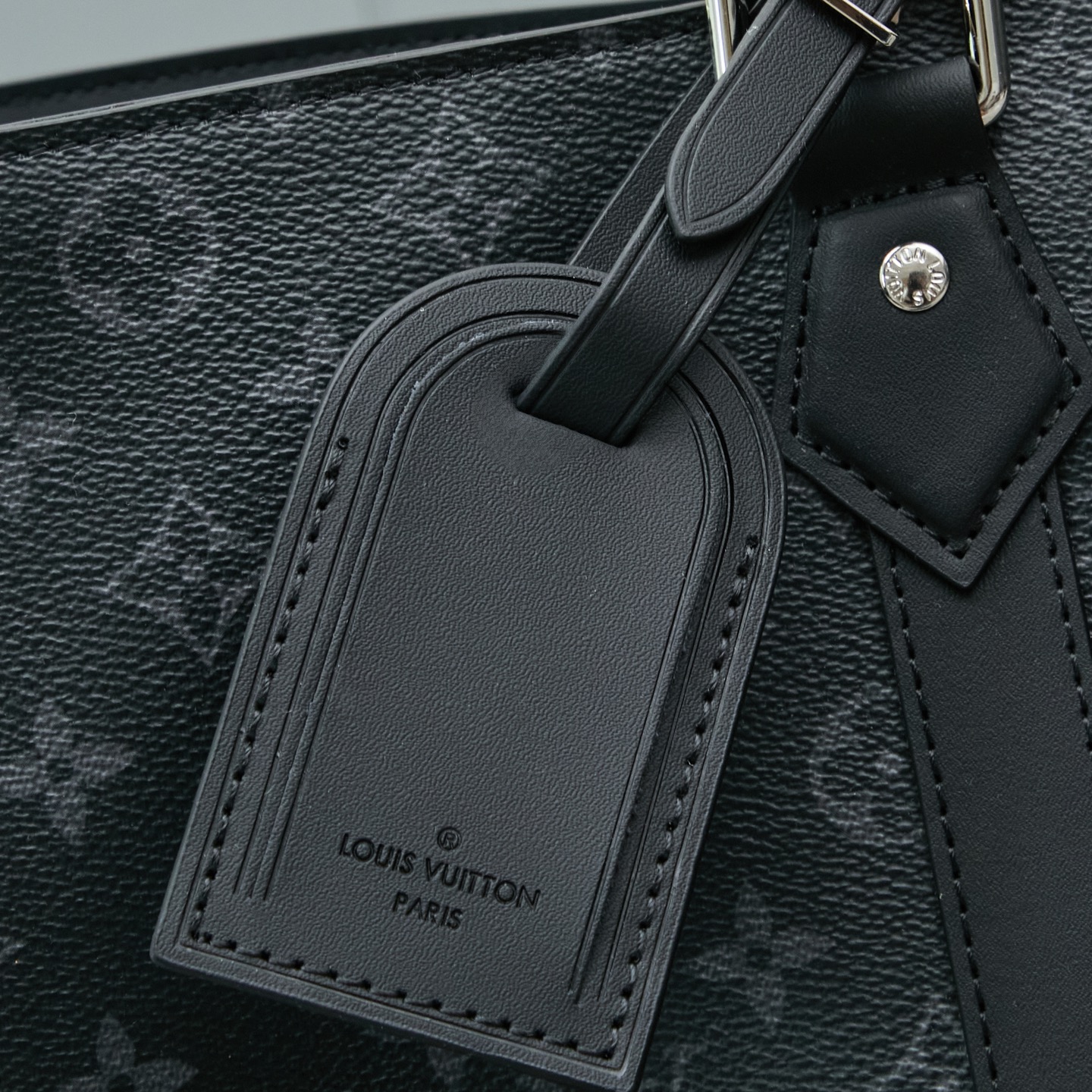 Louis Vuitton M46451 Black Monogram: A spacious handbag from the Sac Plat collection, the Sac Plat 24H features leather trim.