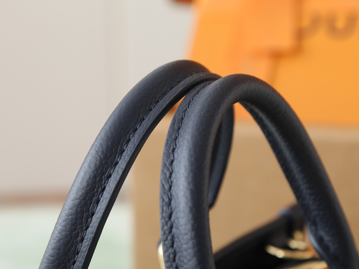 Louis Vuitton M23640 Deep Blue Embossed: This small OnTheGo handbag is crafted from Monogram Empreinte leather, embossed with the Giant Monogram pattern.