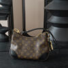 Louis Vuitton Crafted from classic Monogram canvas, this small Boulogne handbag features a double-zip closure and a spacious interior flat pocket large enough to accommodate a smartphone.
