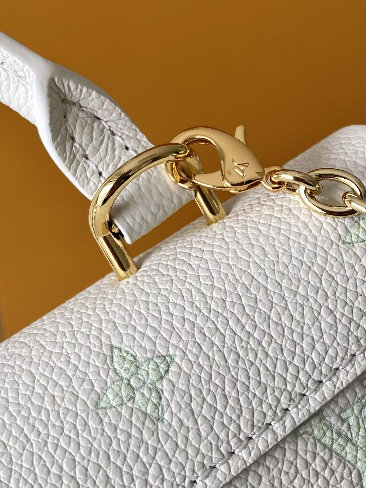 Louis Vuitton This Nano Madeleine handbag reimagines the Madeleine in Monogram Empreinte leather.