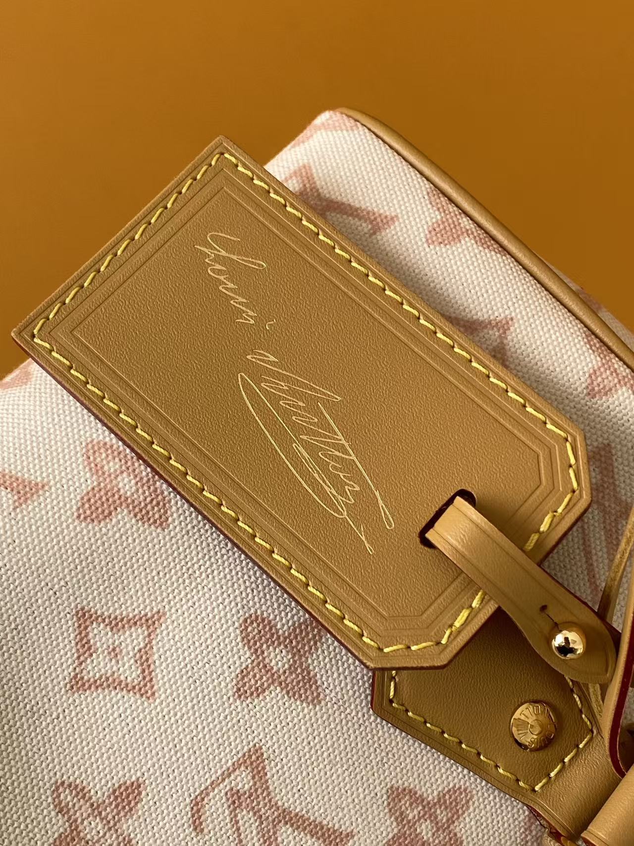 Louis VuittonThis Speedy Bandoulière 20 handbag encapsulates the design of the brand's traditional Speedy travel bag.