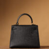 Hermes Kelly bag, black, 25cm, with gold hardware.