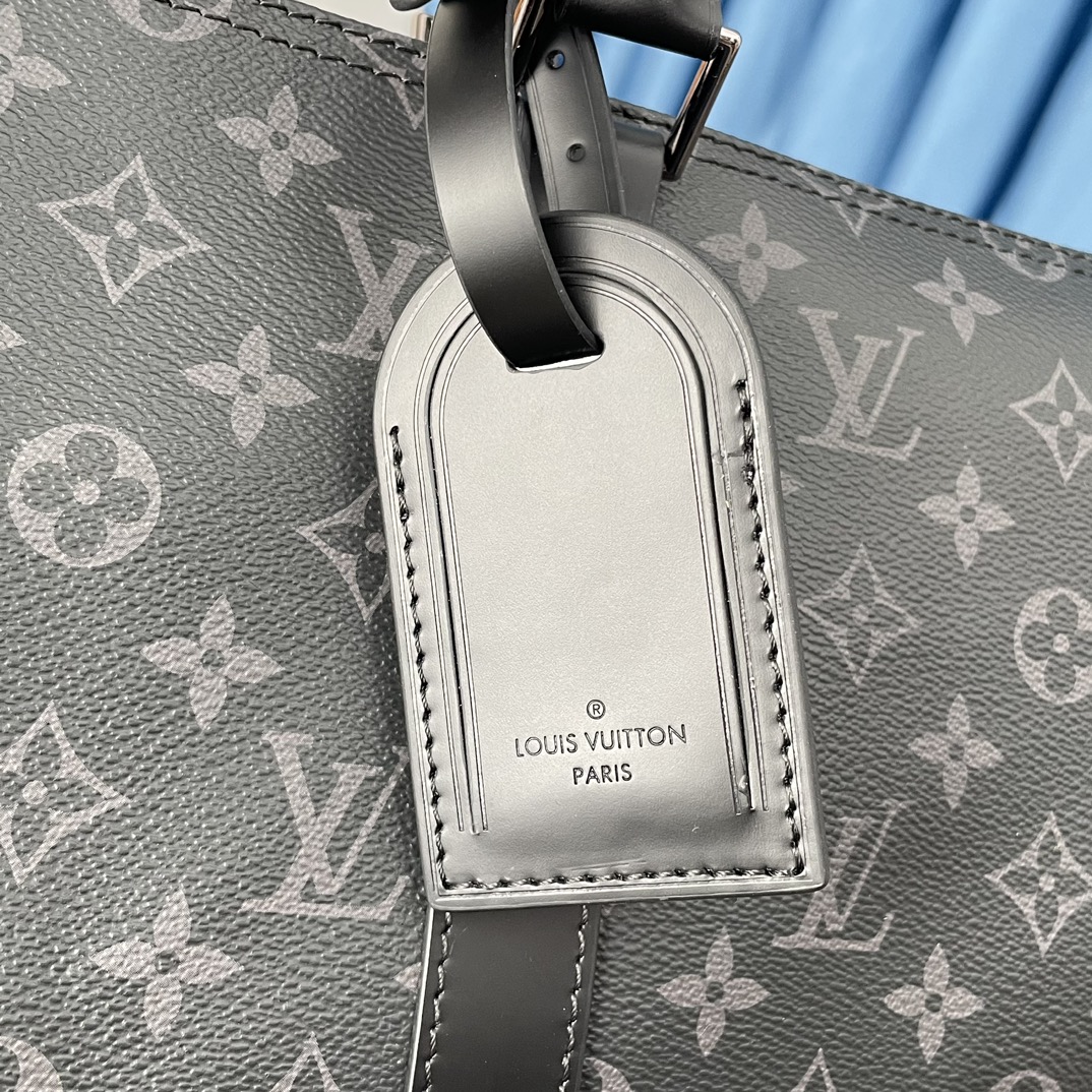 Louis Vuitton The Keepall 50 travel bag, crafted from the new, iconic black and grey Monogram Eclipse canvas.