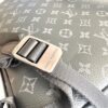 Louis Vuitton This small Discovery backpack features a patchwork of Monogram Eclipse canvas and vibrant cowhide leather.