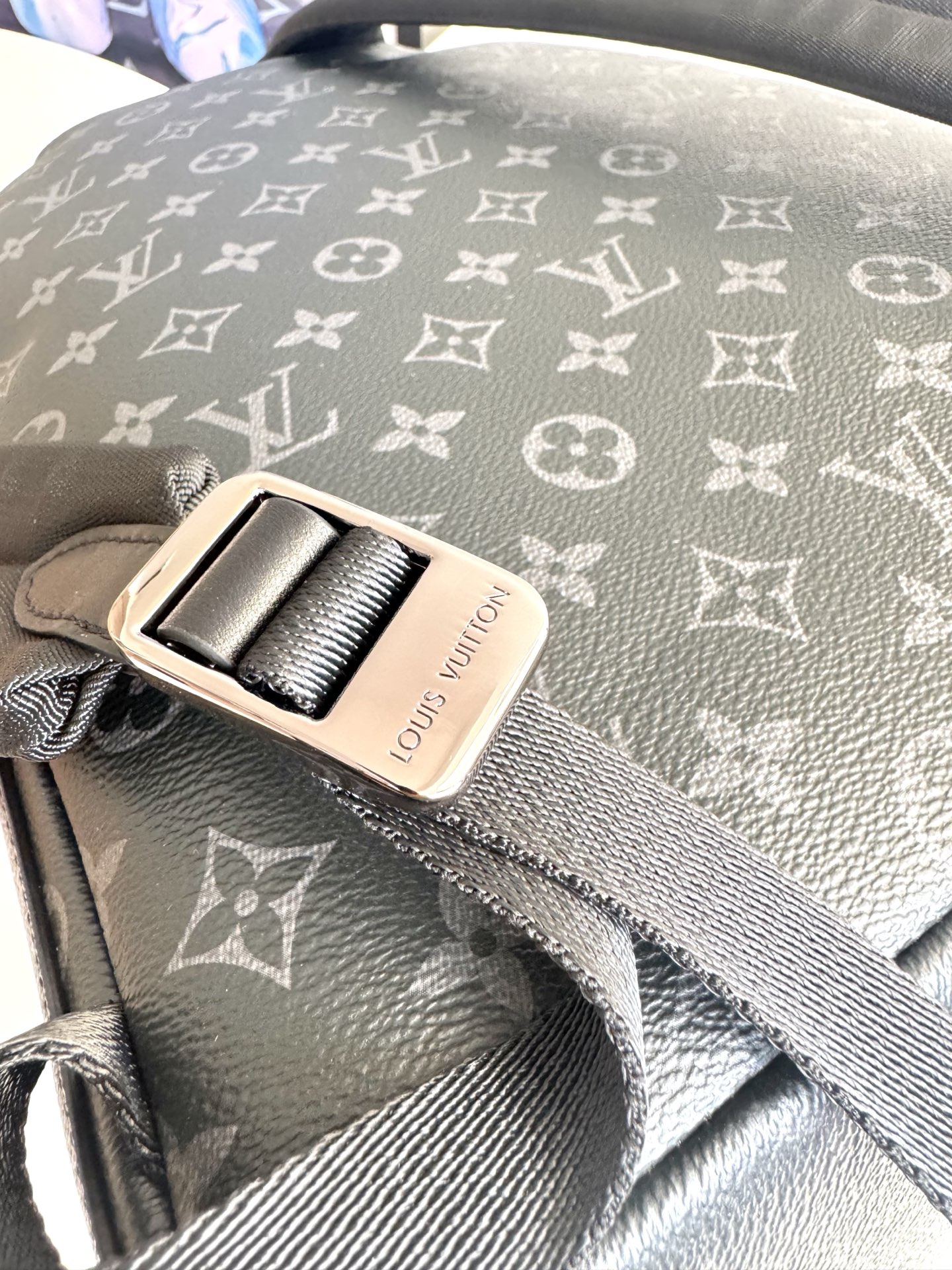 Louis Vuitton This small Discovery backpack features a patchwork of Monogram Eclipse canvas and vibrant cowhide leather.