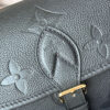 Louis Vuitton This Diane handbag is crafted from Louis Vuitton's classic Monogram Empreinte embossed leather.