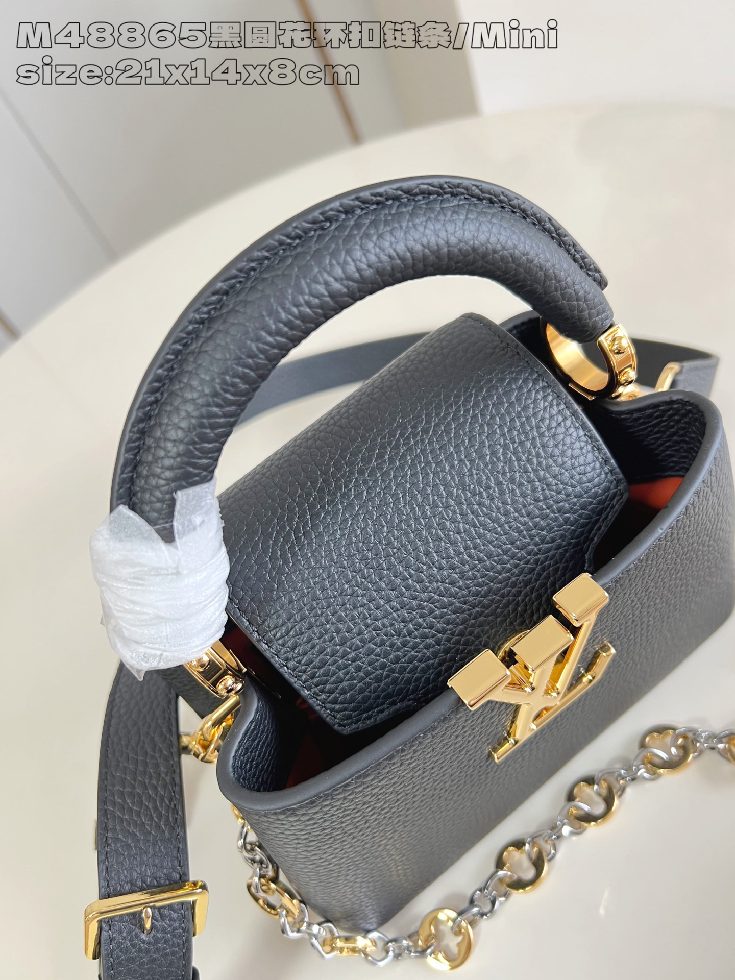 The Capucines Mini handbag, part of the Capucines Chain On You collection, is crafted from soft Taurillon calf leather to offer ample space.