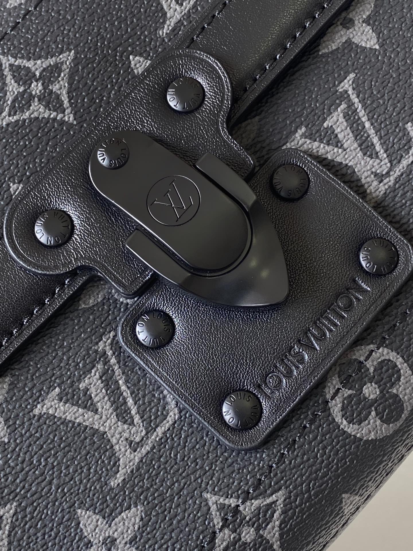 Louis Vuitton This Soul Trunk handbag is crafted from Monogram Eclipse canvas.