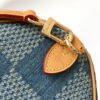 Louis Vuitton The new FW Denim Speedy 25 handbag—whether worn crossbody...