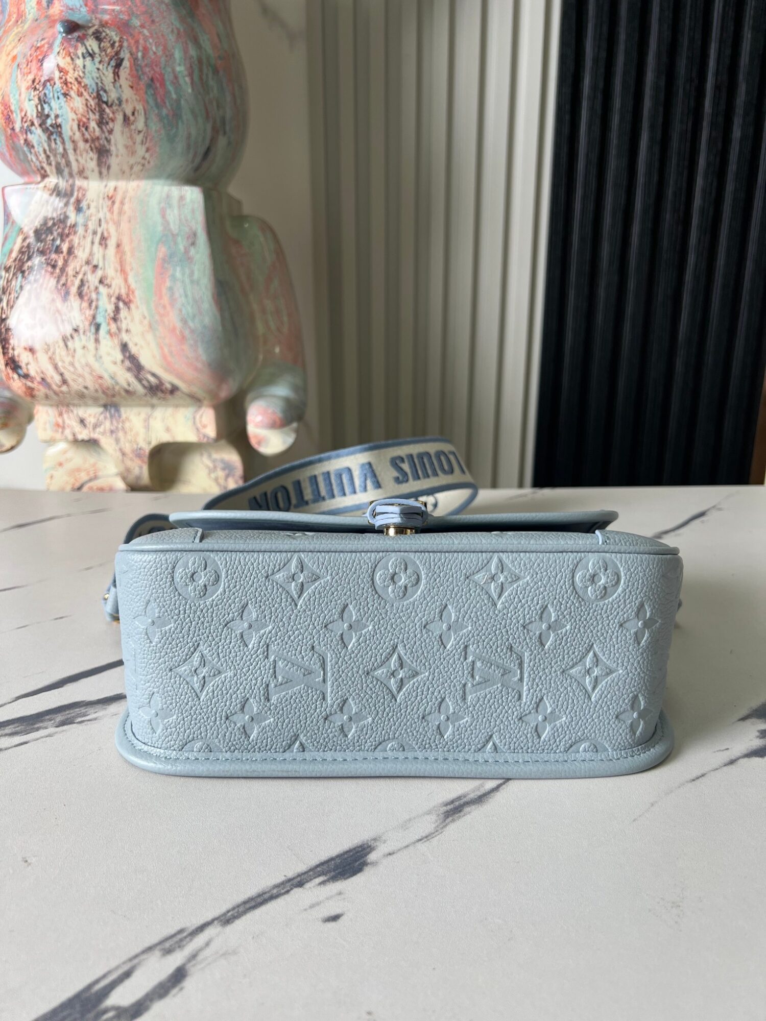 Louis Vuitton This Diane handbag infuses Monogram Empreinte embossed leather with elegant tones.