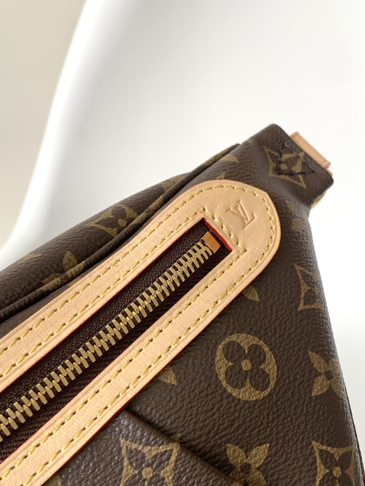 Louis Vuitton The M46784 High-Rise Bag is crafted from Montaigne-coated canvas.