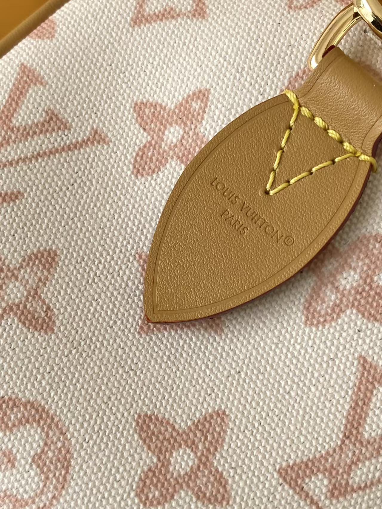 Louis VuittonThis Speedy Bandoulière 20 handbag encapsulates the design of the brand's traditional Speedy travel bag.