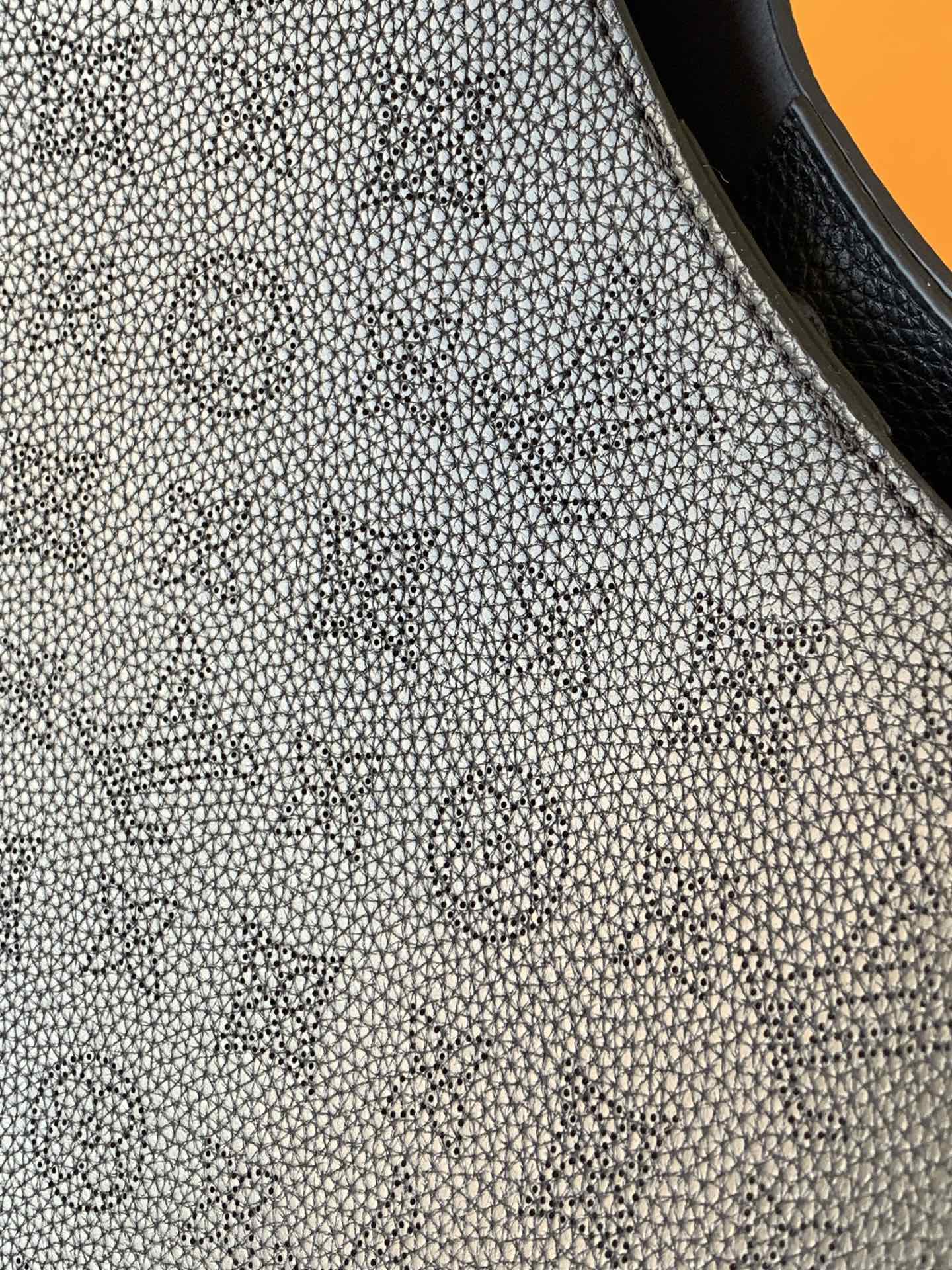 Louis Vuitton This Carmel bag from the Flight Mode collection features the season's new gradient design.