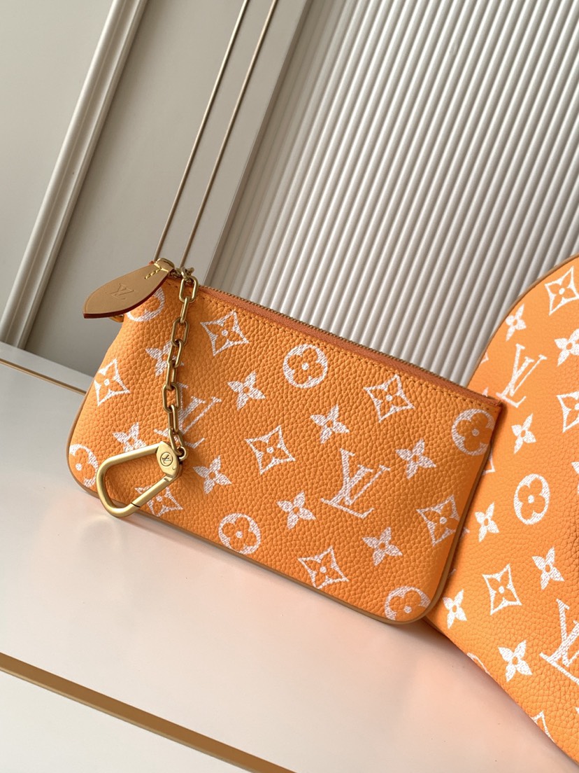 Louis Vuitton M14064 Orange: This Sedy Bandoulière 30 handbag features a design rendered upon a surface of refined cowhide leather.