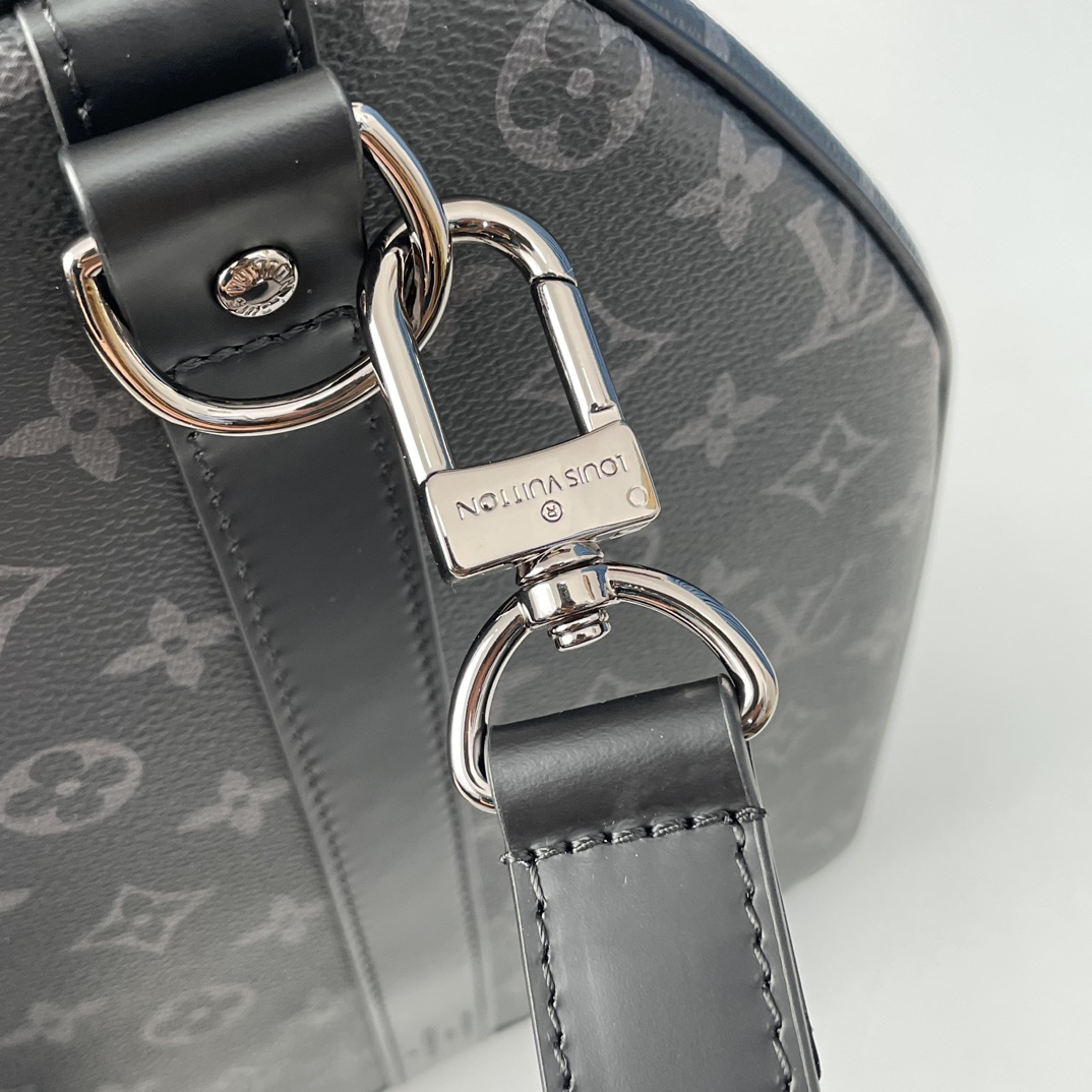 Louis Vuitton The Keepall 50 travel bag, crafted from the new, iconic black and grey Monogram Eclipse canvas.