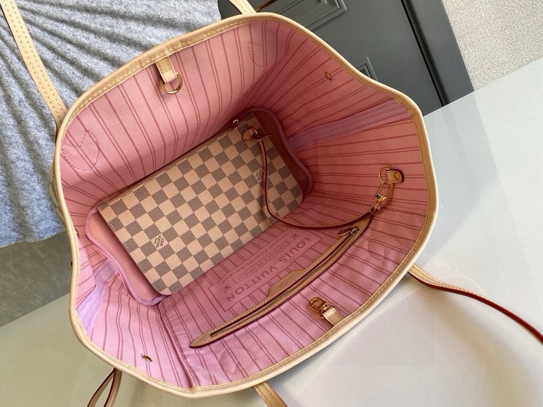 Louis Vuitton The legendary Neverfull handbag: always ready to meet your every need.