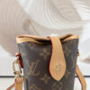 Louis Vuitton Mini Ice Cream Cone Bag — New "Fold Me" Mini Model, featuring a magnetic button closure design.