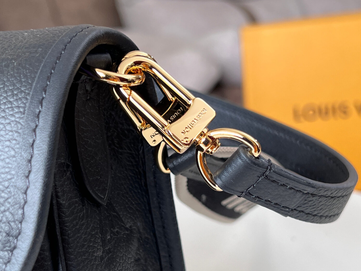 Louis Vuitton This Diane handbag is crafted from Louis Vuitton's classic Monogram Empreinte embossed leather.