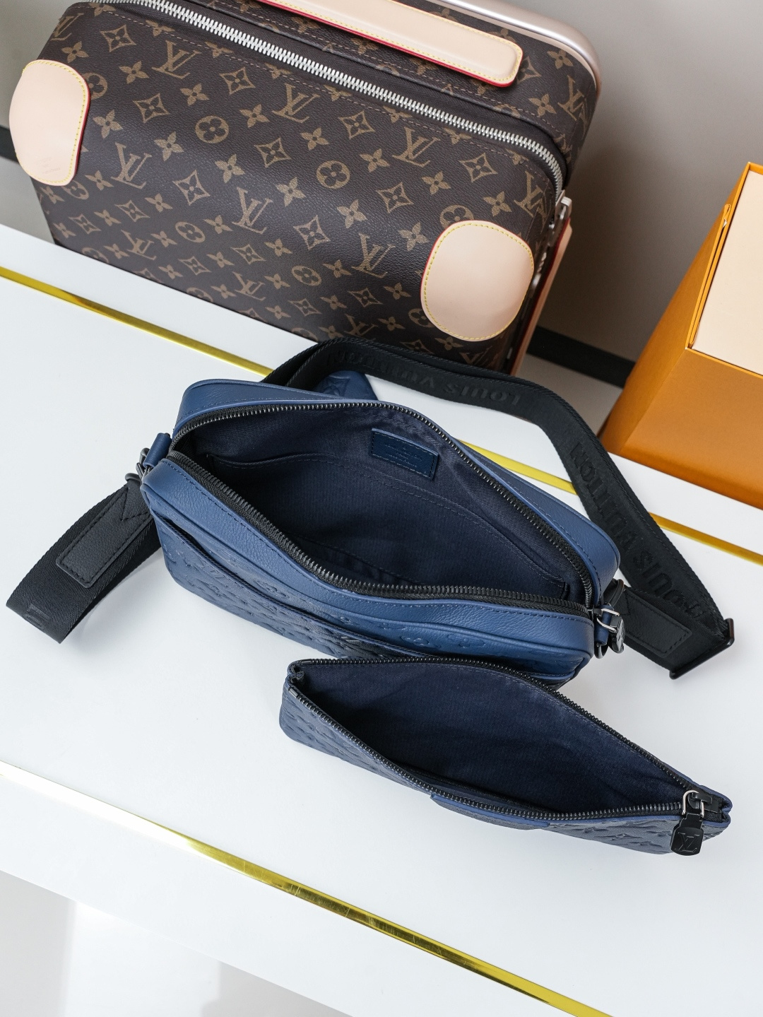 Louis Vuitton This Trio Messenger bag is crafted from soft Monogram Shadow calf leather.