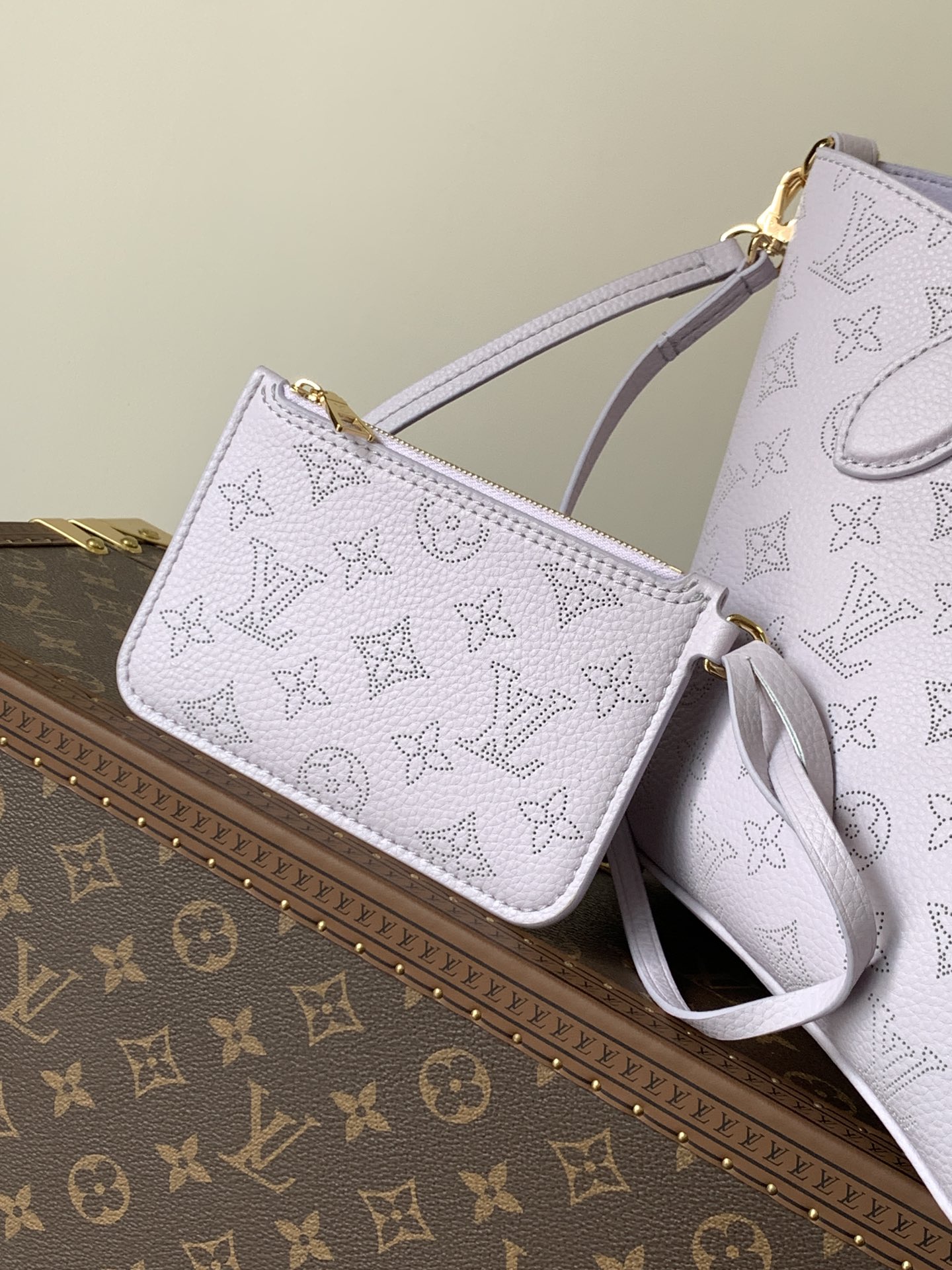 Louis Vuitton This small Blossom handbag is steeped in the modern hues of the new season.