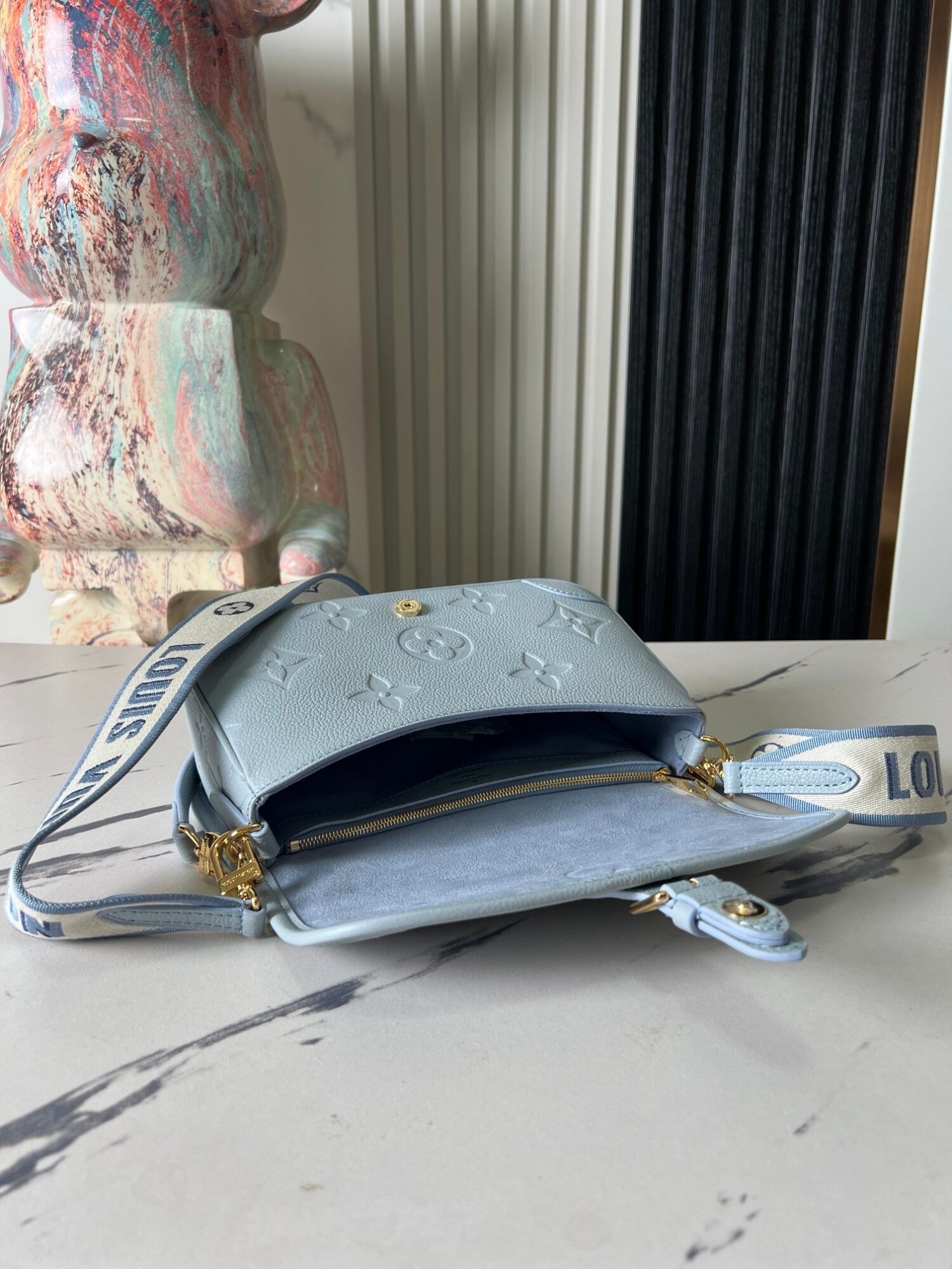 Louis Vuitton This Diane handbag infuses Monogram Empreinte embossed leather with elegant tones.