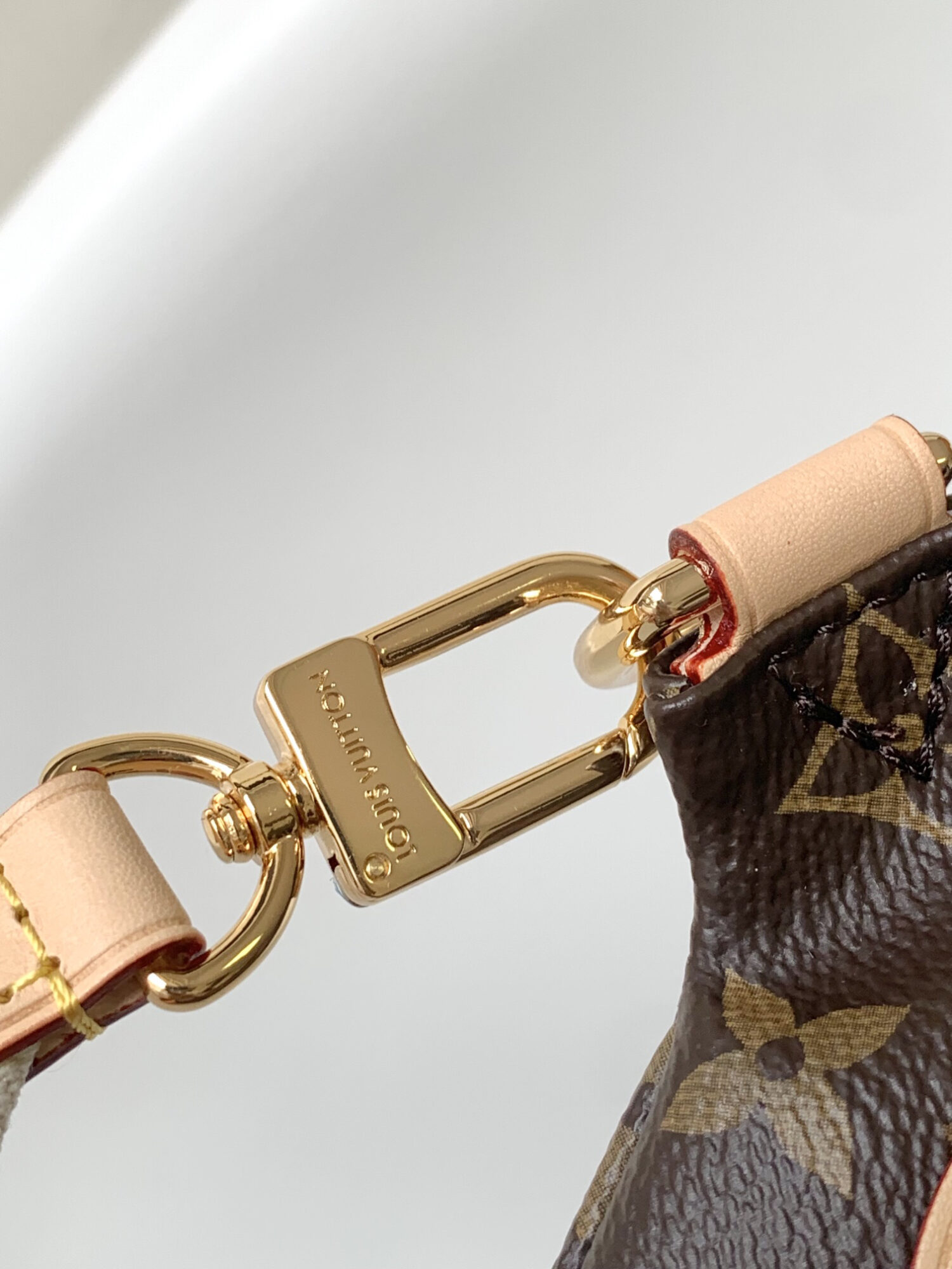 Louis Vuitton The M46784 High-Rise Bag is crafted from Montaigne-coated canvas.