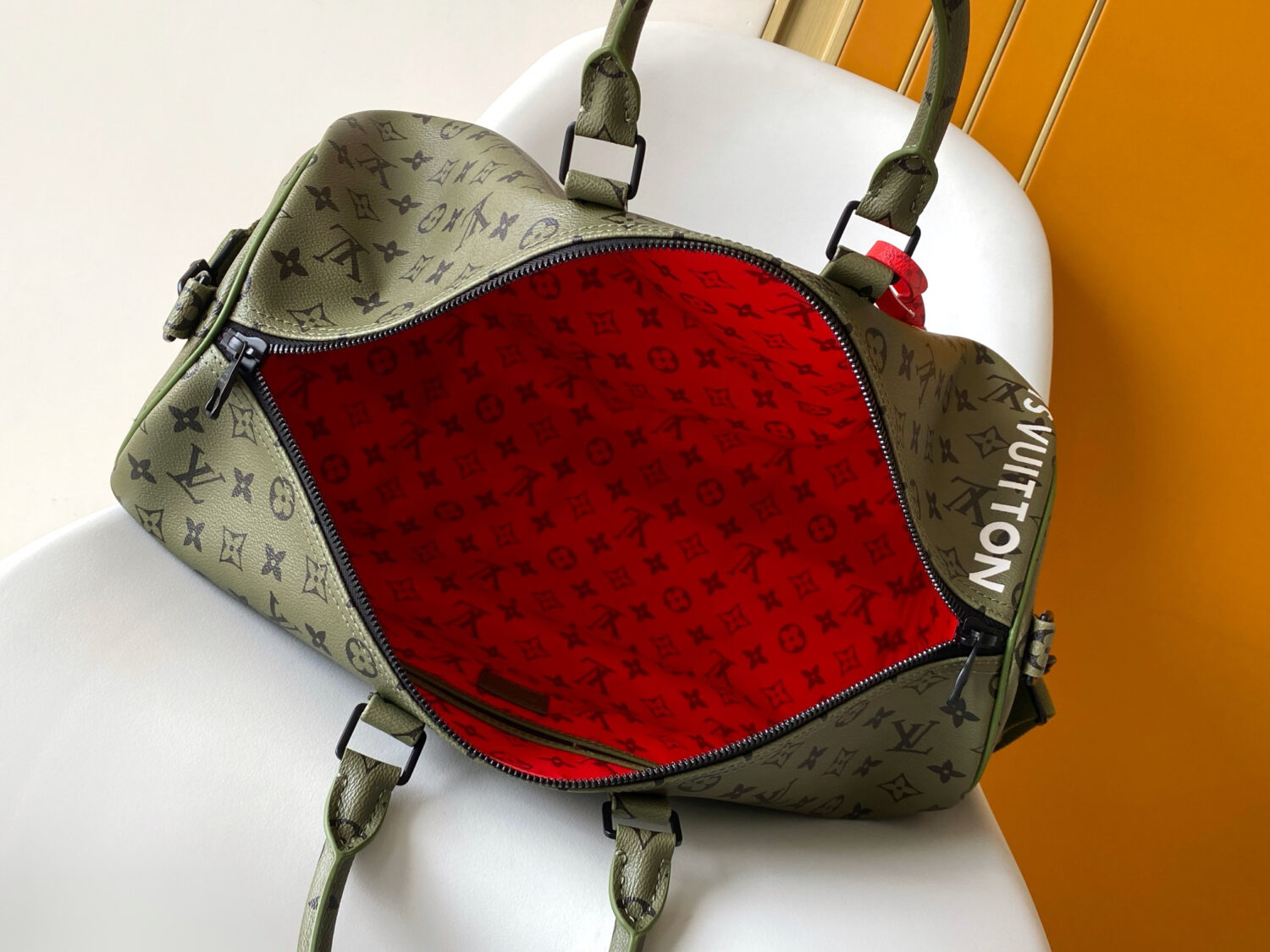 Louis Vuitton This Keepall Bandoulière 45 travel bag is part of the Monogram Tones collection.