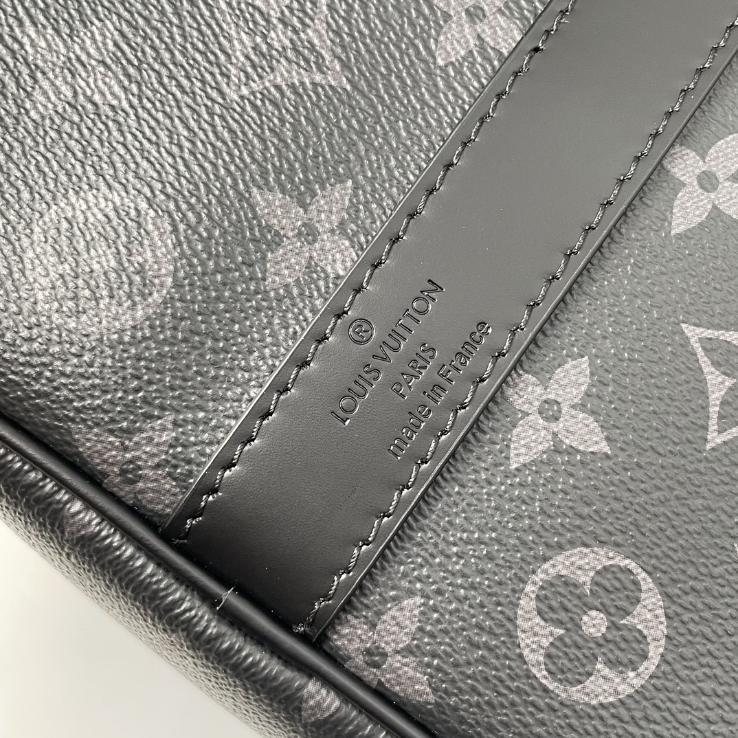 Louis Vuitton The Keepall 50 travel bag, crafted from the new, iconic black and grey Monogram Eclipse canvas.