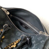 Louis Vuitton This Speedy Soft 30 handbag, part of the Ski Collection, reimagines the classic design in Monogram Eclipse canvas.