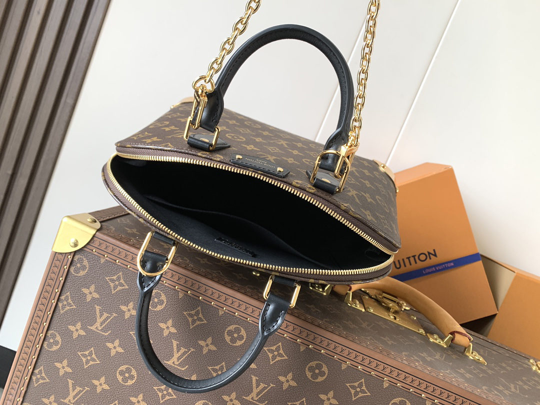 Louis Vuitton The Trunk collection welcomes a contemporary new iteration of the Alma Small handbag, paying homage to the brand's travel heritage with exquisite metal hardware.
