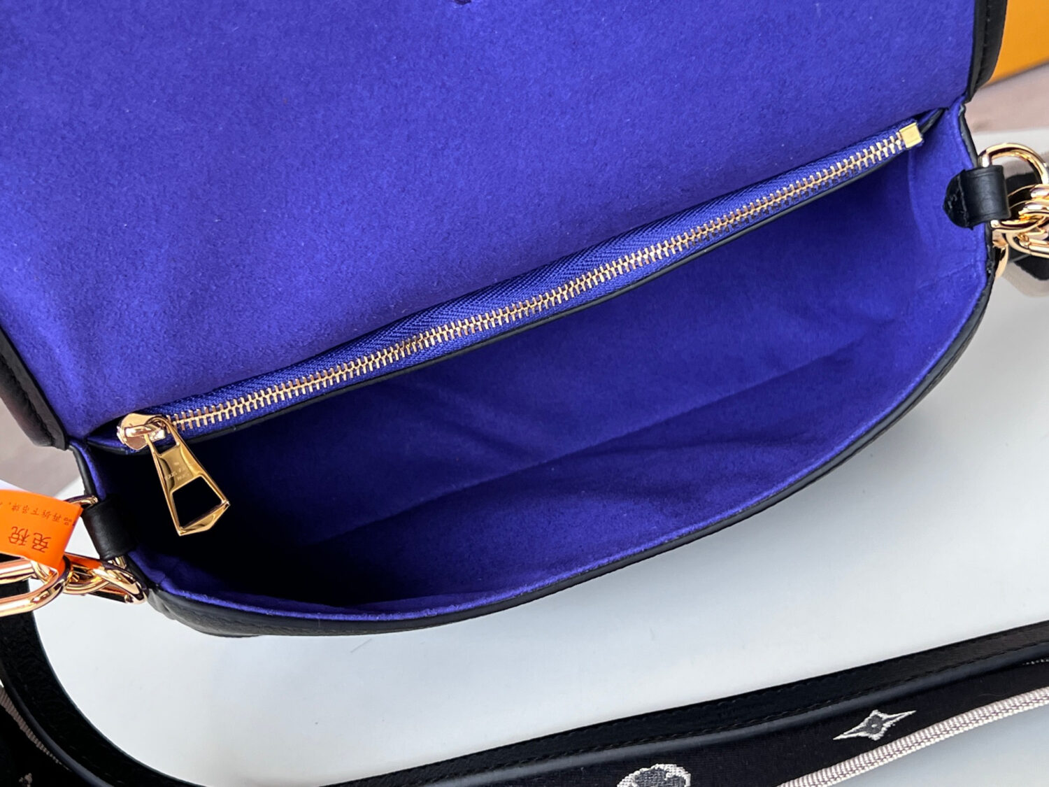 Louis Vuitton This Diane handbag is crafted from Louis Vuitton's classic Monogram Empreinte embossed leather.