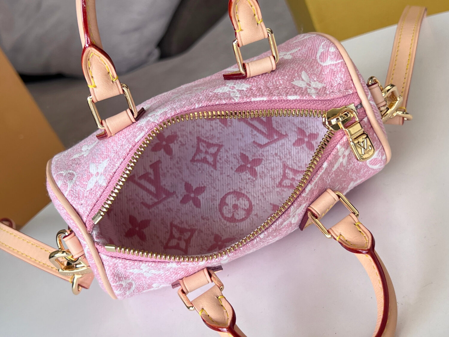 Louis Vuitton The Nano Speedy handbag crafted from classic Monogram canvas.