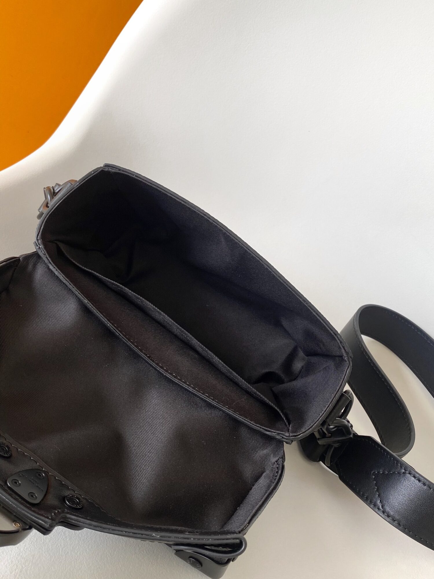 Louis Vuitton This Soul Trunk handbag is crafted from Monogram Eclipse canvas.