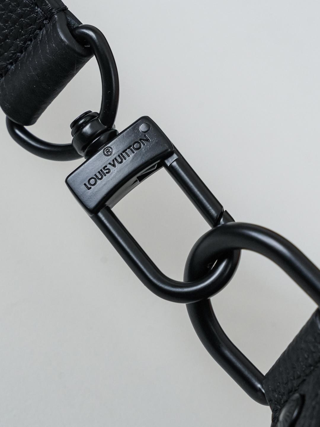 Louis Vuitton This Keell Bandoulière 25 handbag features Monogram Midnight coated canvas accented with a deep Monogram print.