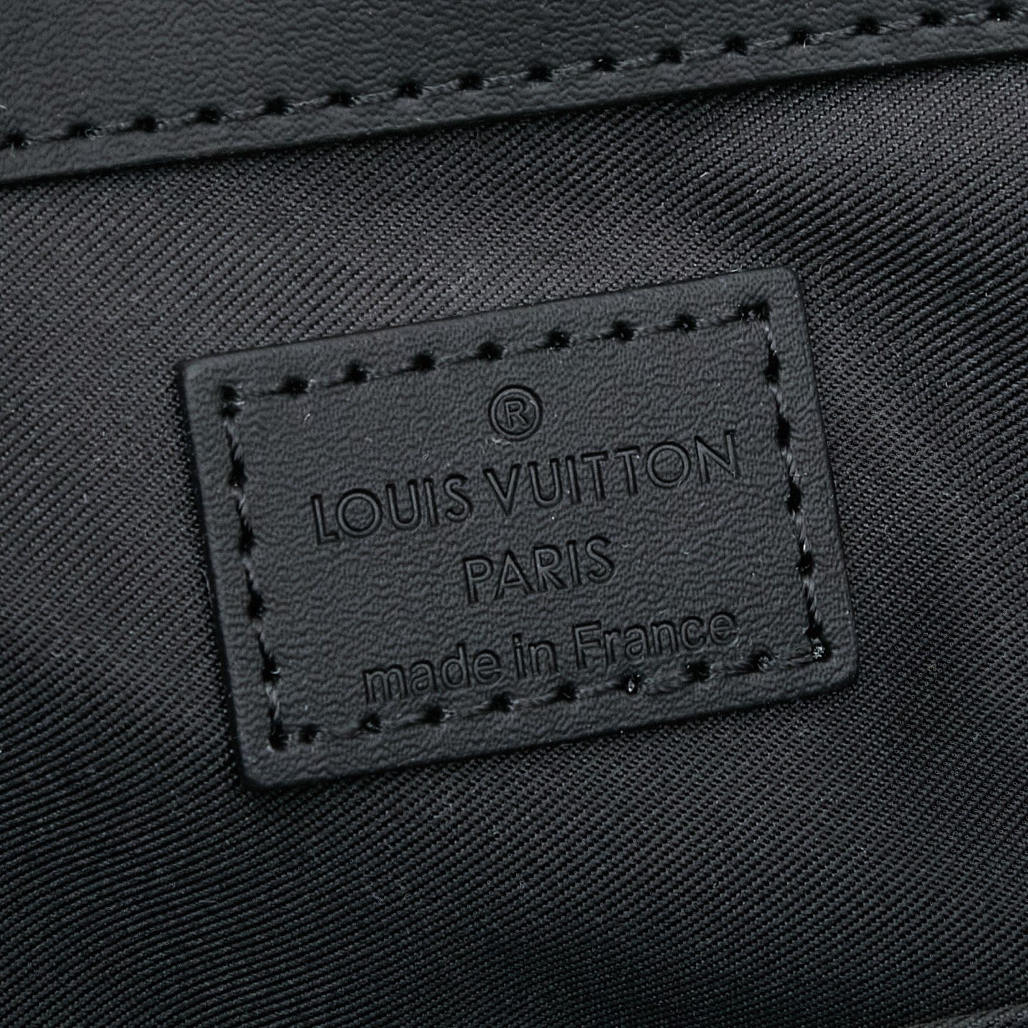 Louis Vuitton M46451 Black Monogram: A spacious handbag from the Sac Plat collection, the Sac Plat 24H features leather trim.