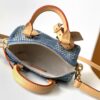 Louis Vuitton N40682 — FW New Denim Collection. The Sunset bag takes center stage in Monogram Denim canvas.