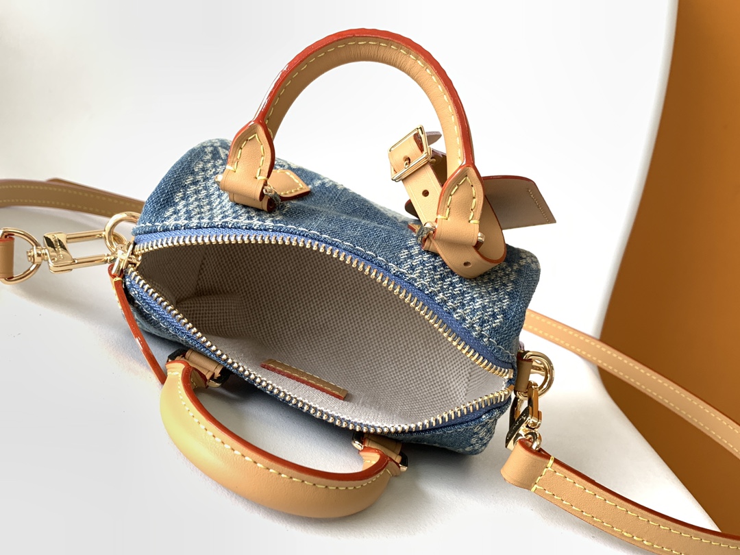 Louis Vuitton N40682 — FW New Denim Collection. The Sunset bag takes center stage in Monogram Denim canvas.